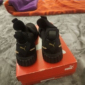 PUMA Black and Gold Women's Athletic Shoes